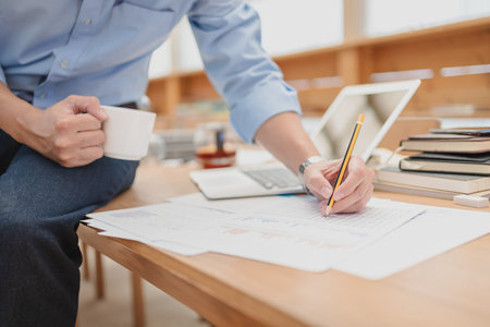 businessman using pencil checking document data calculator for calculate budget accountancy. finance...