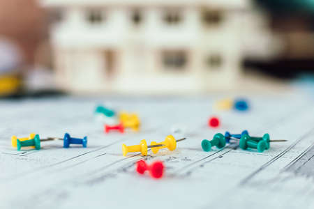 pin on design plan on the table. Tool of architecture concept.の写真素材