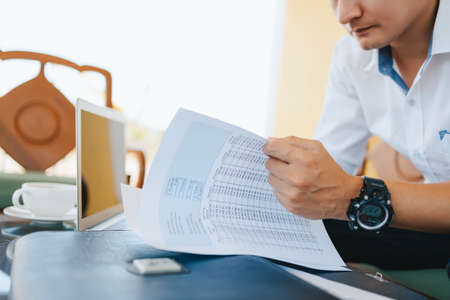 businessman working data document report marketing research, development planning, management strategy, analysis financial accounting. finance and accounting conceptの写真素材