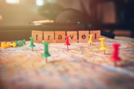 pins pinned on the map. pushpin showing the location of a destination point on a map. Travel plan concept.の写真素材