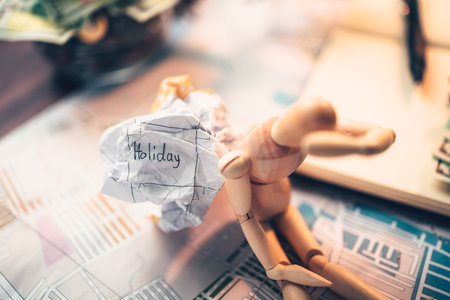 Crump paper calendar with the word holiday written on. Cancel and fail plan Travel, holiday,...