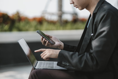 Employees fired or resigned from the company are using their mobile phones to find a jobs and schedule an interview.
Unemployed, hiring job, quitting job concept.の写真素材