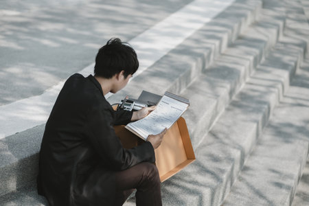 Employees fired or resigned from the company are writing job applications form. Unemployed, hiring job, quitting job concept.の写真素材