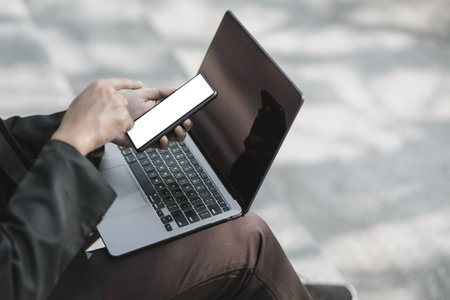 Employees fired or resigned from the company are using their mobile phones to find a jobs and schedule an interview.
Unemployed, hiring job, quitting job concept.の写真素材