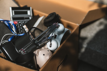 Cardbox of Employees fired or resigned on stairs. Unemployed, hiring job, quitting job concept.の写真素材