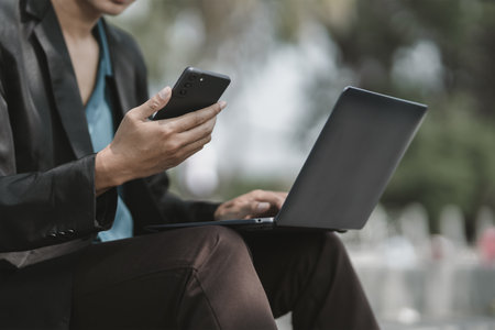 Employees fired or resigned from the company are using their mobile phones to find a jobs and schedule an interview.
Unemployed, hiring job, quitting job concept.の写真素材