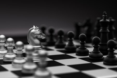 The chess horse in the front is acting as a leader in the work.の写真素材