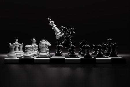 White king chess pieces destroy black king chess pieces over the chess board. Leader, plan, fight, destroy, win, lose concept.の写真素材