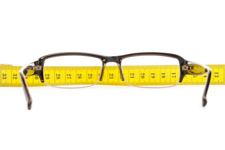 glasses and measuring tapeの写真素材
