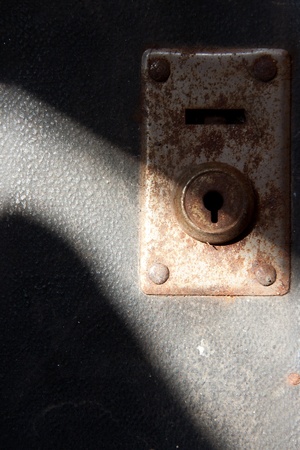 Lock of antique trunk with light rays.の写真素材
