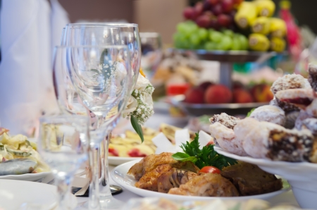 Delicious prepared and decorated food on table in restaurant.の写真素材