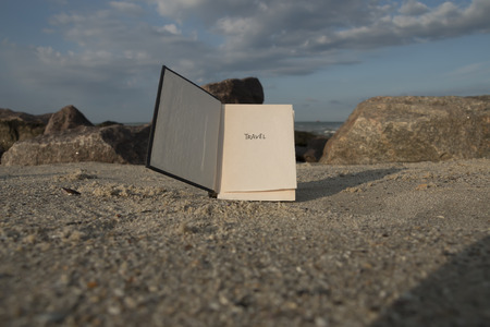Travel - Inscription on the Book. Travel Concept. Beach background.の写真素材