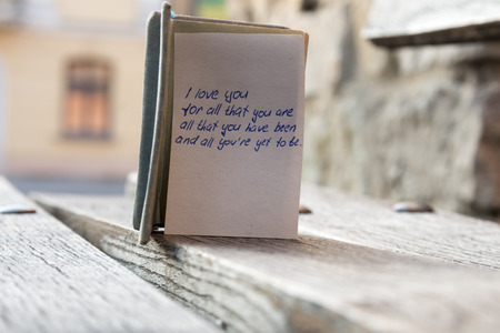 I love you, the inscription on a piece of paper and a book, vintage tonedの写真素材