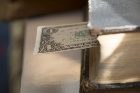 Dollars in the books, business training.の写真素材