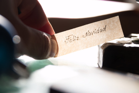 Feliz Navidad - Merry Christmas spanish textの写真素材