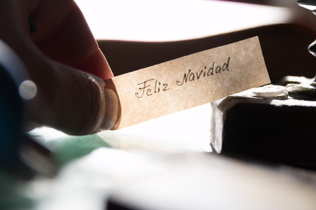 Feliz Navidad - Merry Christmas spanish textの写真素材