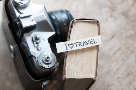 text I Love Travel, book and old cameraの写真素材