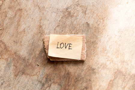 love concept. label on the wooden background.の写真素材