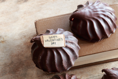 Happy Valentine's Day Hand Lettering, book and chocolate marshmallowの写真素材