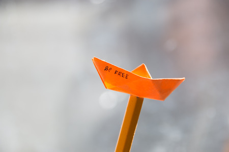 be free concept, the inscription on a paper boatの写真素材