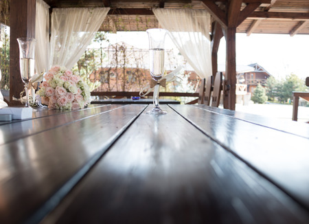 Wine glass on a table decorated for an event celebrationの写真素材