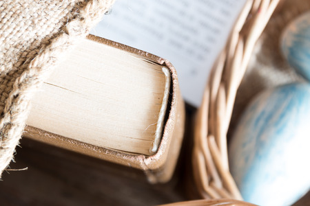 Easter background: book, basket and eggs.の写真素材