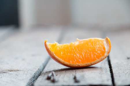 slice of orange on a wooden table