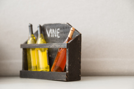 Wine concept. Word wine, written in chalk and bottles.の写真素材
