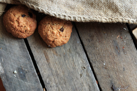 Homemade Oatmeal cookies on a old wooden table
