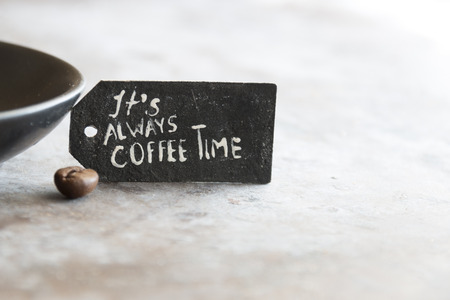 Coffee bean and tag "it always coffee time"の写真素材