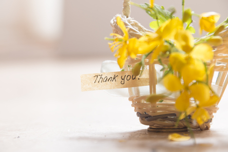 thank you letter tag or label a basket of flowersの写真素材