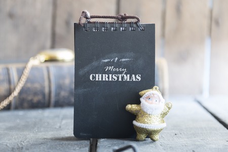 Merry Christmas - inscription on the label and santa.の写真素材