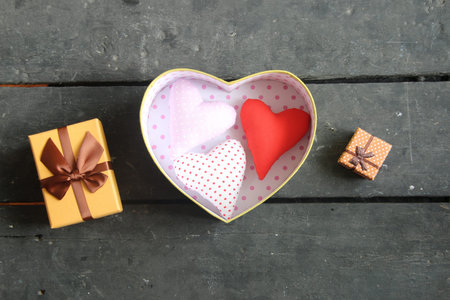 love, valentine idea, heart on a wooden tableの写真素材