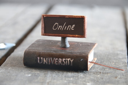 Book - computer and inscription university, vintage style.の写真素材