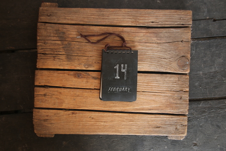 14 February Valentine's Day idea. Calendar on vintage table.の写真素材