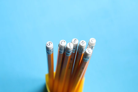 science concept, inscription on a yellow pencil