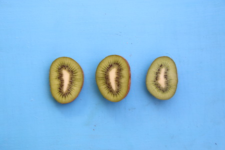 Kiwi fruit on blue background, art styleの写真素材