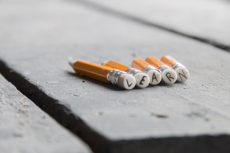 Learn concept, inscription on a yellow pencilの写真素材