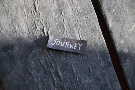 Journey tag on vintage background, soft focusの写真素材