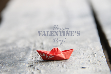 Happy Valentines Day creative card. Blurred photos for the background.の写真素材