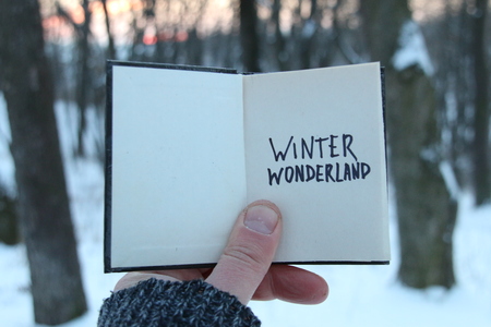Winter wonderland idea. Book and text.の写真素材