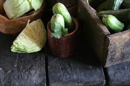 Healthy eating and vegetarian concept. Green cabbage and Cucumbers.の写真素材