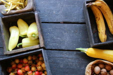 Raw Organic Yellow Zucchini on a wooden tableの写真素材