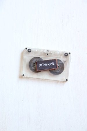 Retro music concept. Old compact cassette and tag.の写真素材