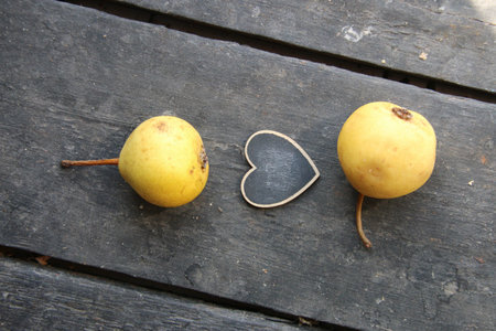 Love background. Heart plate on vintage surface.の写真素材