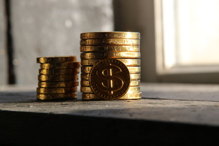 graph of gold coins on vintage background, copy space