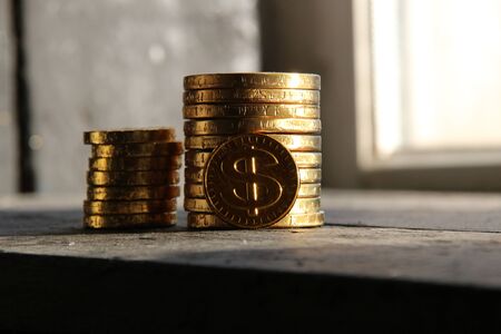 graph of gold coins on vintage backgroundの写真素材