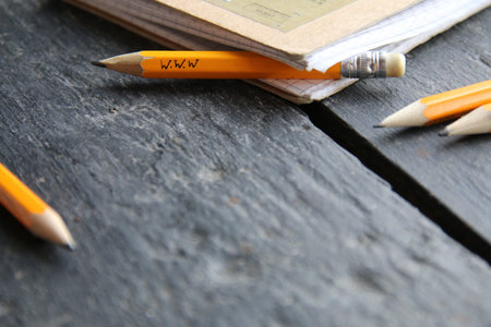 online education concept, pencil with www inscription on the table