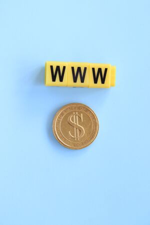 online business concept, inscription of yellow cubes on a blue backgroundの写真素材