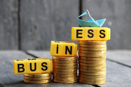 business, profit growth concept, graph of gold coins,